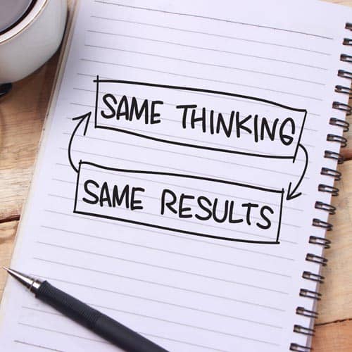 The words ‘Same Thinking, Same Results’ written on a notepad to remind you to change your thinking
