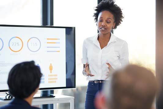 Cropped shot of businesswoman presenting digital analytics on a monitor to discuss search intent
