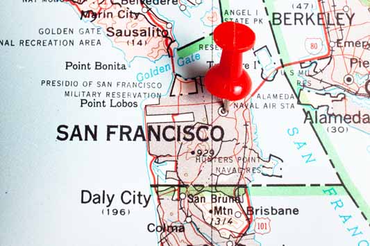Red pushpin marking San Francisco on a map as the benefits of social media marketing is local events