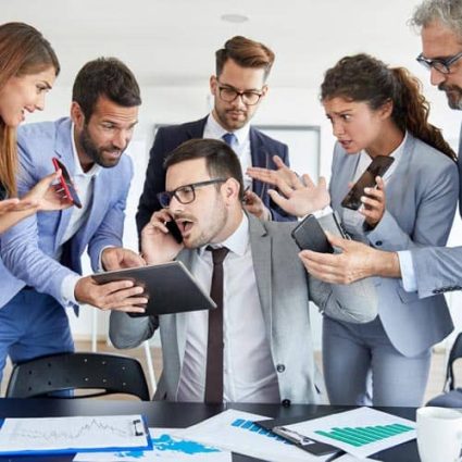 A small business owner overwhelmed with staff and vendors that don’t communicate with each other